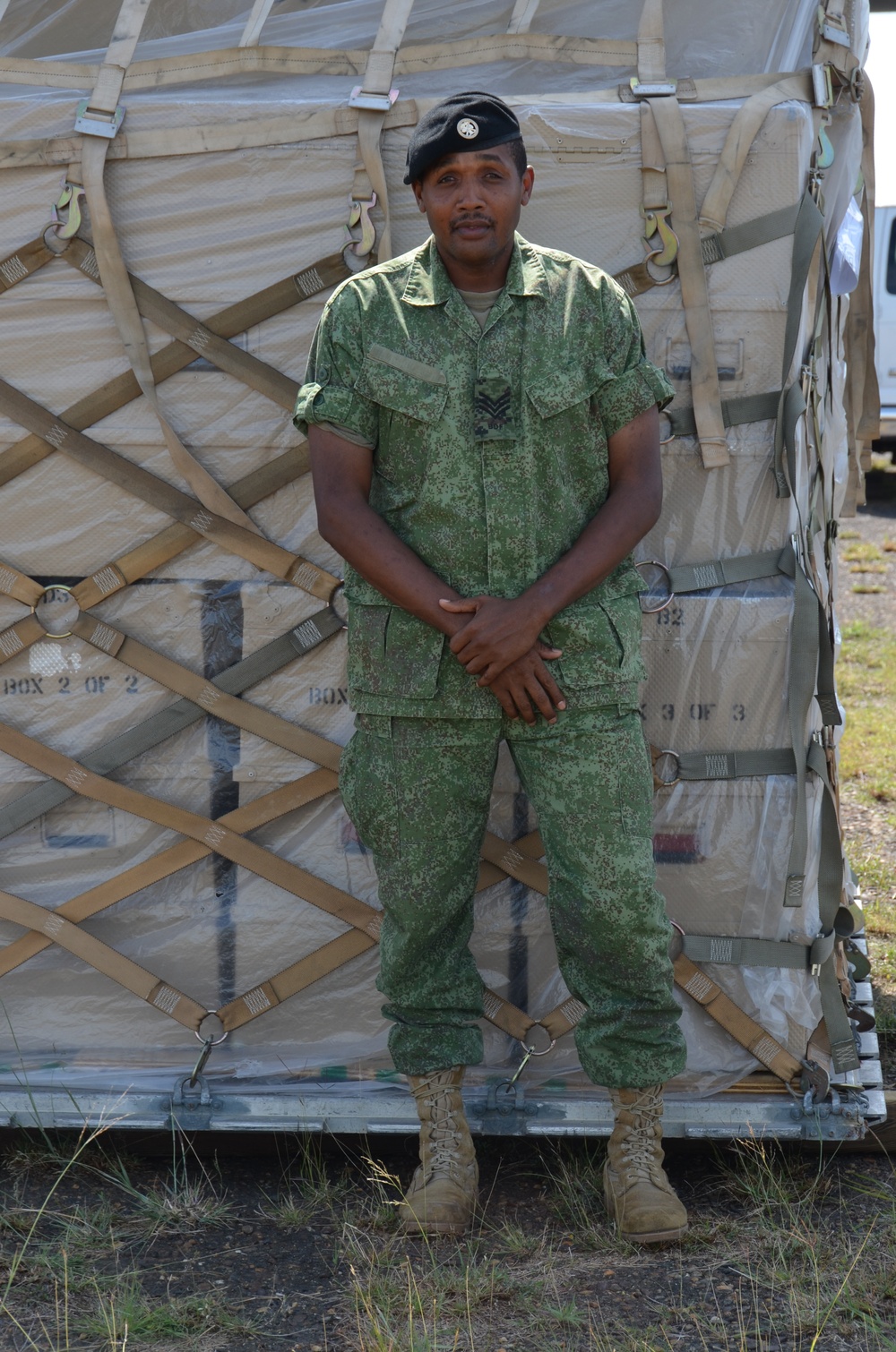 New Horizons Belize team off-loads cargo from C-17