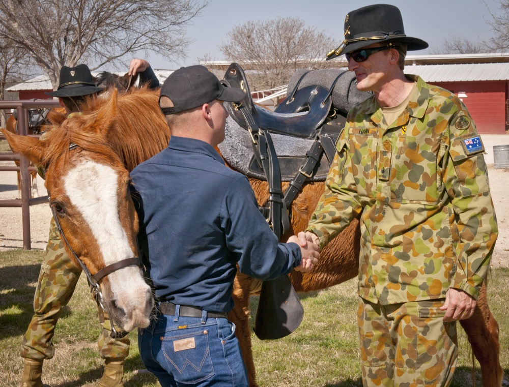 Australian soldiers take a ride with 1st Cav horse detachment