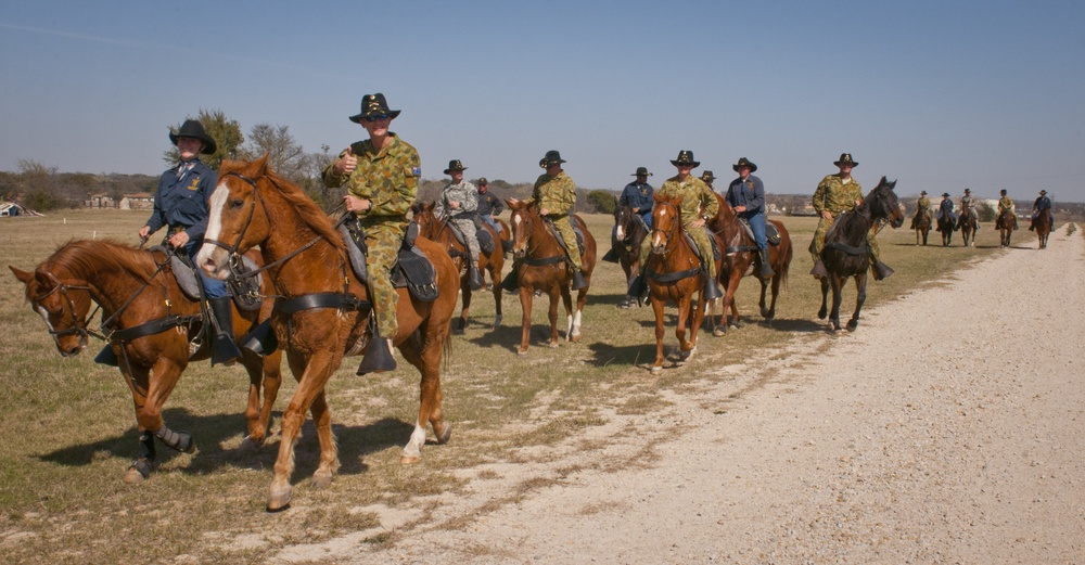 Australian Defense Force soldiers take a ride with 1st Cav. Div. horse detachment