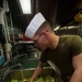 Marines and Sailors prepare lunch aboard the USS Bataan