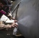 22nd MEU Marines mark aircraft, prevent corrosion