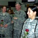 2nd Lt. Julia O'Neil receives a rose from Col. Hensley