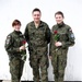 Polish female soldiers pose with ceremony's leader at Camp Bondsteel, Kosovo