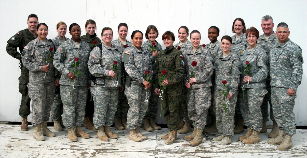 Female soldiers at MNBG-E pose for group photo at Camp Bondsteel, Kosovo