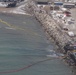 Crews deploy boom along Lake Michigan shore