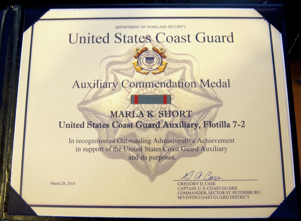 Coast Guard Station St. Petersburg ombudsman receives the Auxiliary Commendation Medal