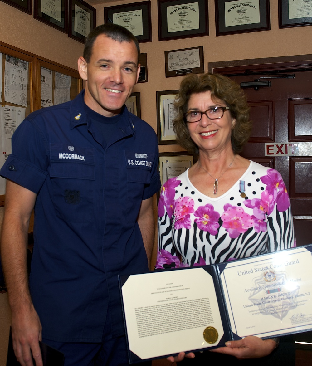 Coast Guard Station St. Petersburg ombudsman receives the Auxiliary Commendation Medal