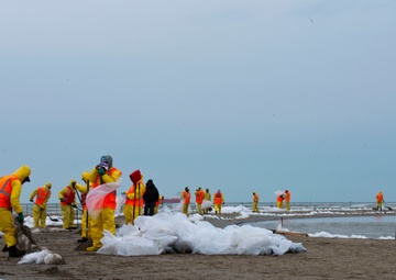 Cleanup crews work ahead of impending inclement weather