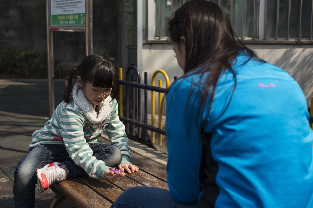 Crossing Borders: Airmen connect with kids at Korean orphanage