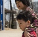 Crossing Borders: Airmen connect with kids at Korean orphanage