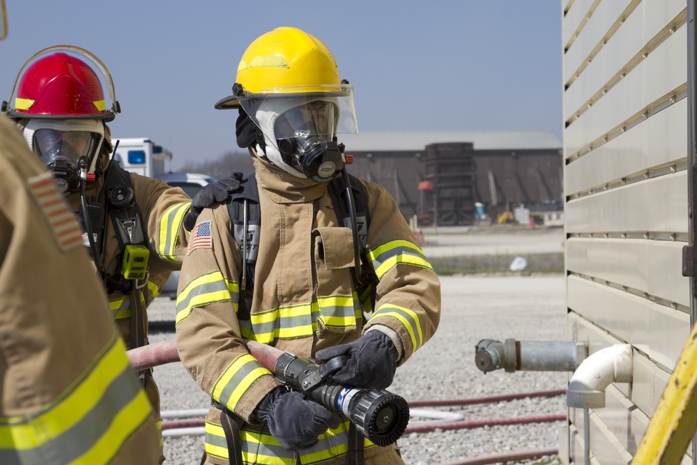 Camp Bondsteel firefighters turn on the heat