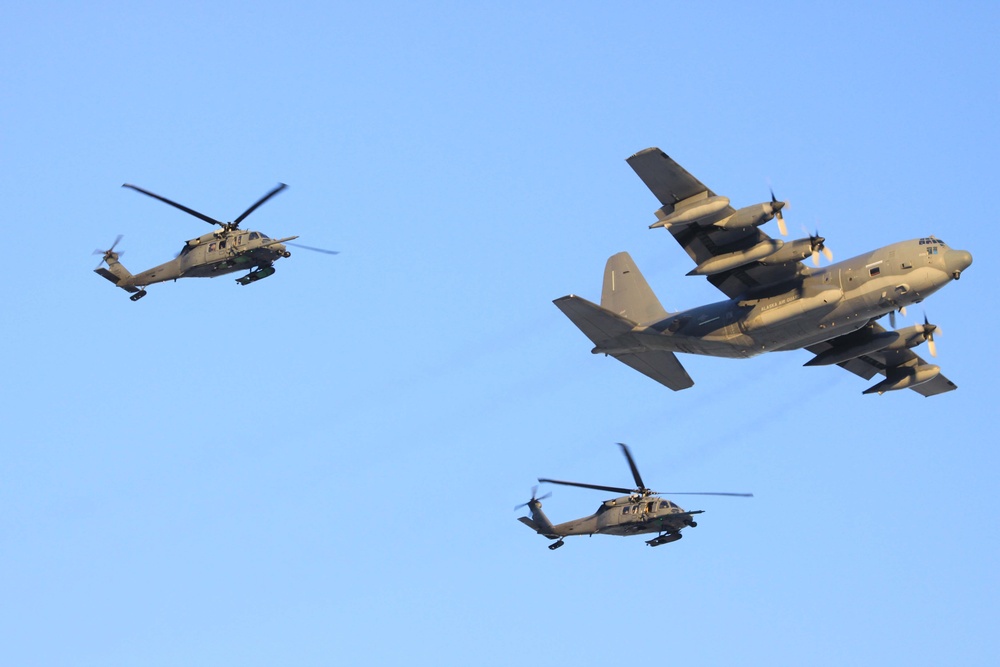 Wing aircraft fly over the base