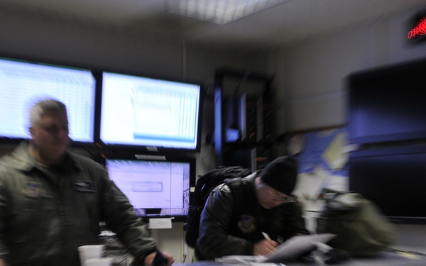 Aircrews prepare their mission plans