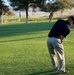 Darkside Marines swing away during golf tournament