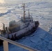 Coast Guard escorts CSL Laurentien through icy Lake Erie