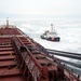 Coast Guard escorts CSL Laurentien through icy Lake Erie