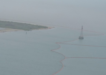 Response crews place boom near Matagorda Bay