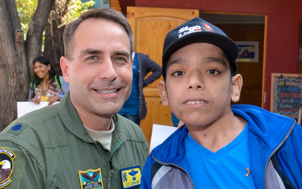 US airmen visit local children during assignment in Chile