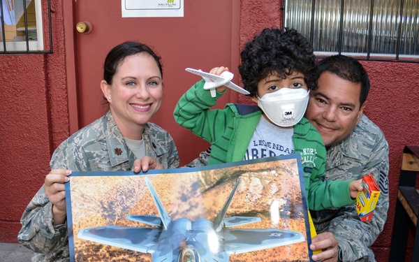 US airmen visit local children during assignment in Chile