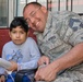 US airmen visit local children during assignment in Chile