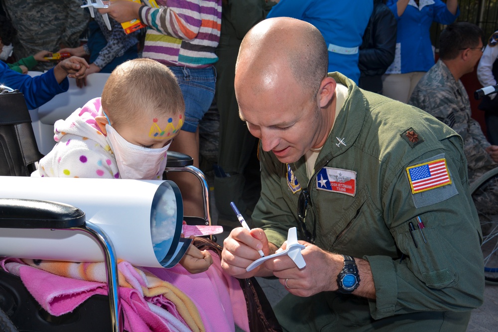 US airmen visit local children during assignment in Chile
