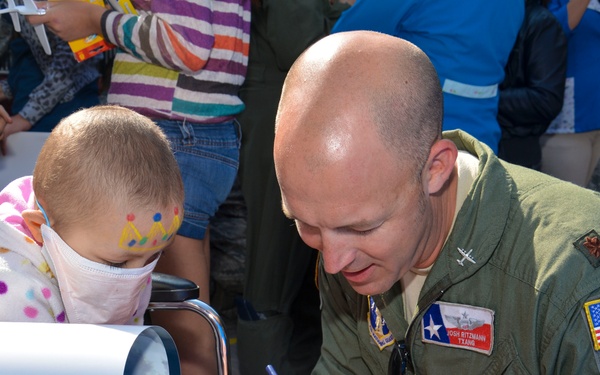 US airmen visit local children during assignment in Chile