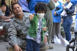 US airmen visit local children during assignment in Chile