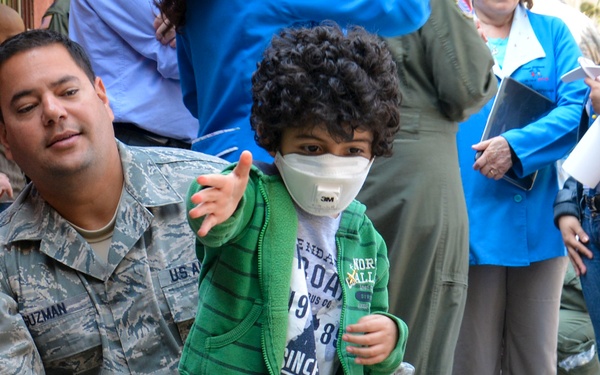 US airmen visit local children during assignment in Chile