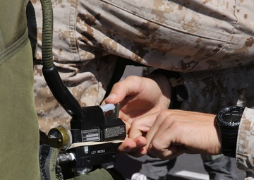 Recon Marines take to skies during double-bag static line course