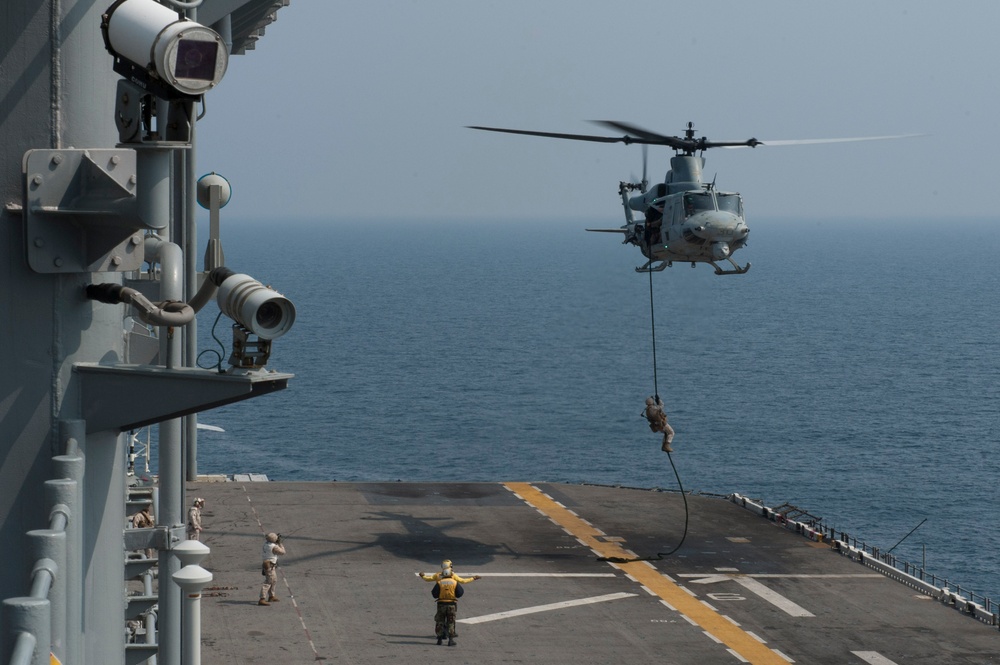 Fast roping from a UH-1Y Venom helicopter