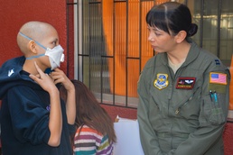 US airmen visit local children during assignment in Chile