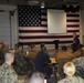 Rear Adm. Kurt Hinrichs addresses reservists at Coast Guard Sector Anchorage