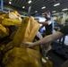 Marines and Sailors receive two tons of mail aboard the Bataan