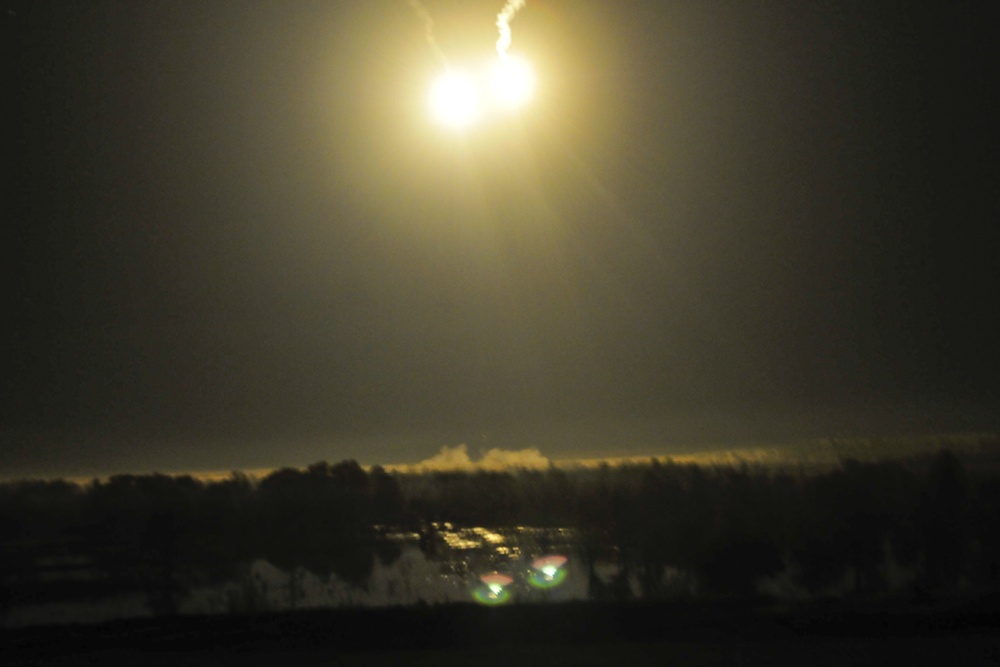 178th Field Artillery lights up the sky