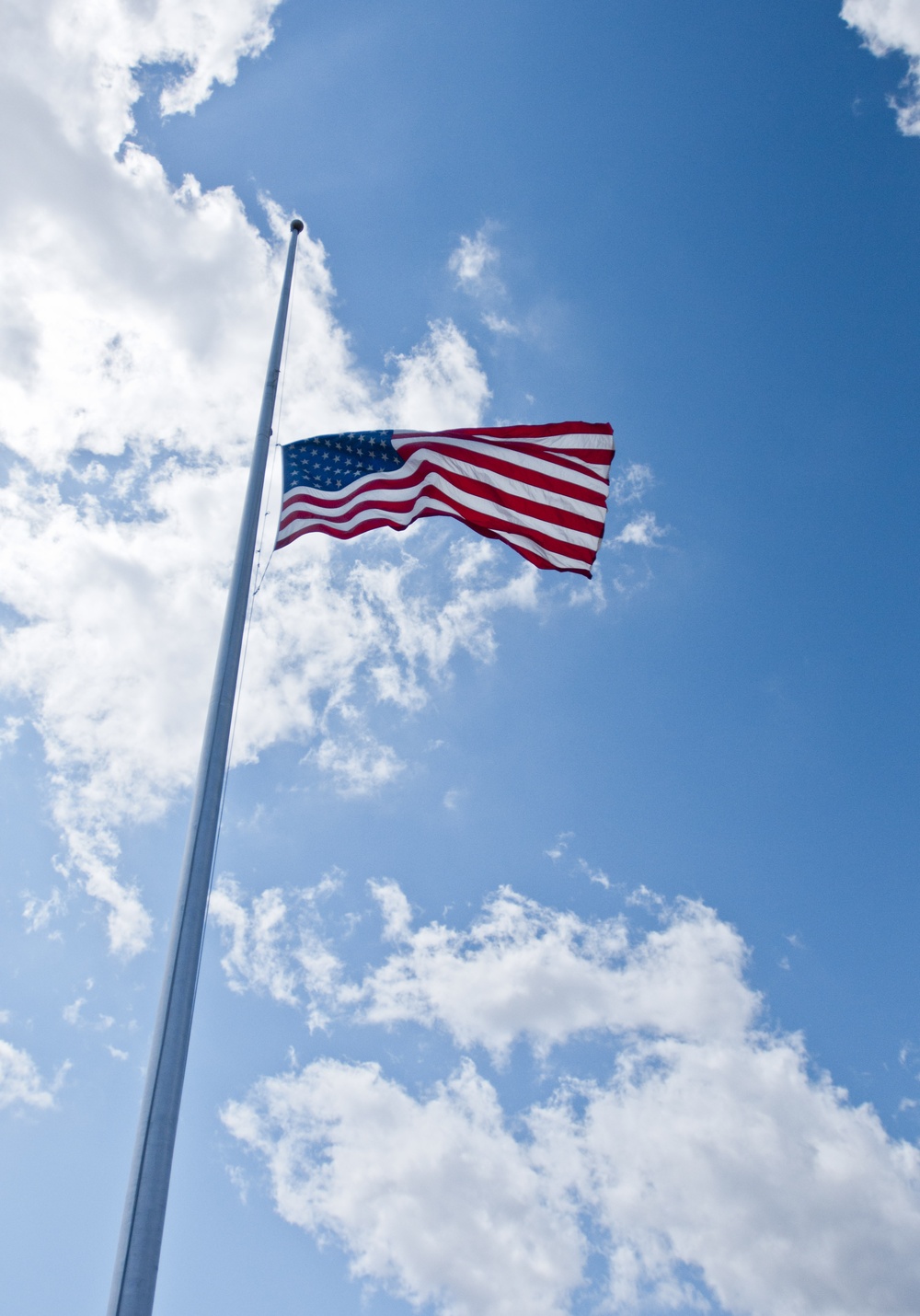 The National Colors fly on Fort Hood