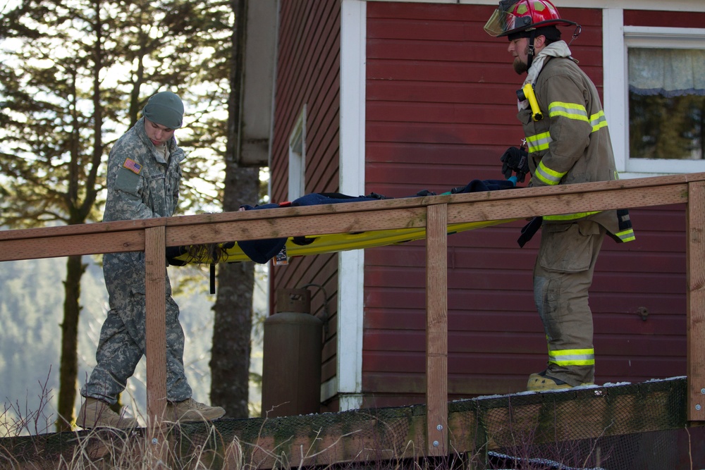 Girl Scouts help first responders train during Alaska Shield 14