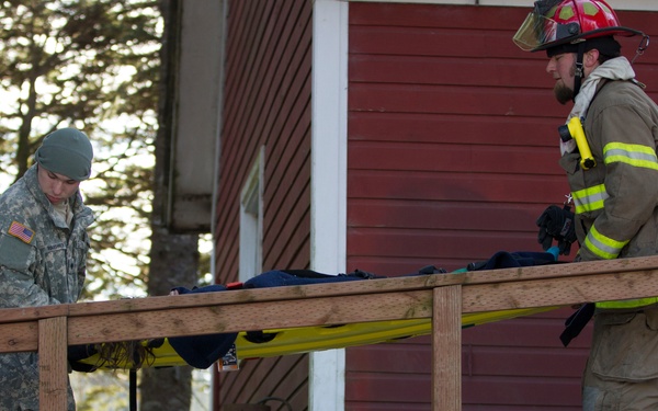 Girl Scouts help first responders train during Alaska Shield 14