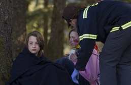 Girl Scouts help first responders train during Alaska Shield 14