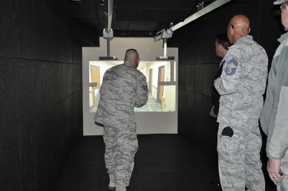 Master Sgt. Yantzy Arnell demonstrates the capability of the new MCSATS facility at the Nevada Air National Guard as Chief Master Sgt. Rob Taulman watches