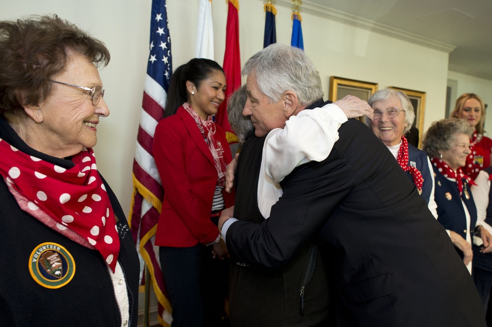 Secretary of Defense Chuck Hagel visits women who worked during World War II