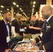 Army team interacts with STEM students at the National Society of Black Engineers Convention
