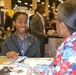 Army team interacts with STEM students at the National Society of Black Engineers convention