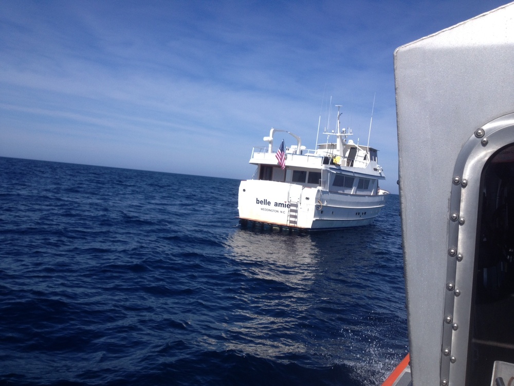 Coast Guard responds to vessel flooding with 5 people aboard