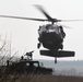 U.S. Army UH-60 Black Hawk helicopter prepares to land to pick up 'mock' wounded soldiers
