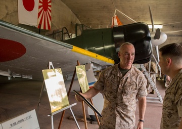 Maj. Gen. Charles L. Hudson, commanding general of Marine Corps Installations Pacific, visits the historic Zero Hangar as part of his visit to Marine Corps Air Station Iwakuni, Japan, April 3, 2014.