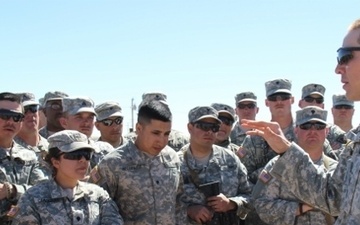 Platoon leader speaks to his Soldiers