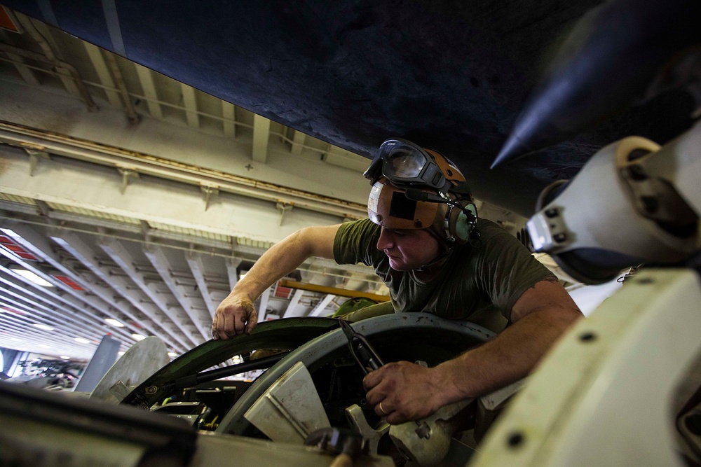 22nd MEU Marines maintain Osprey rotors aboard USS Bataan