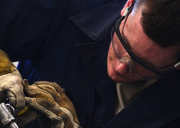 Airman electrifies metal during weld