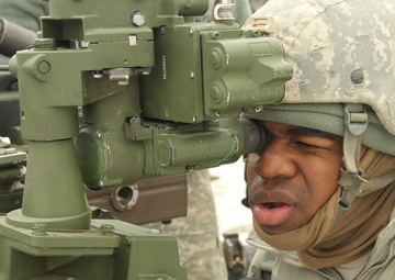 New York Army Guard artillerymen fire big guns at Fort Drum