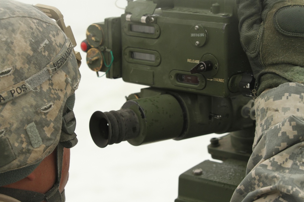 New York Army Guard artillerymen fire big guns at Fort Drum